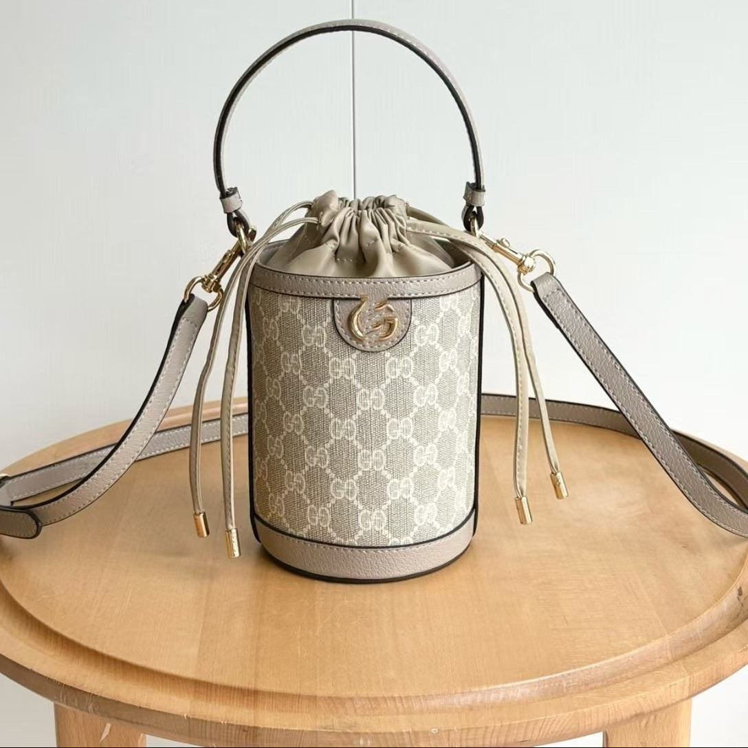 Bucket bag with a pattern on a wooden table against a white background