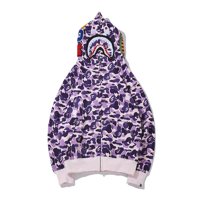Purple camouflage hoodie with shark mouth design on a white background