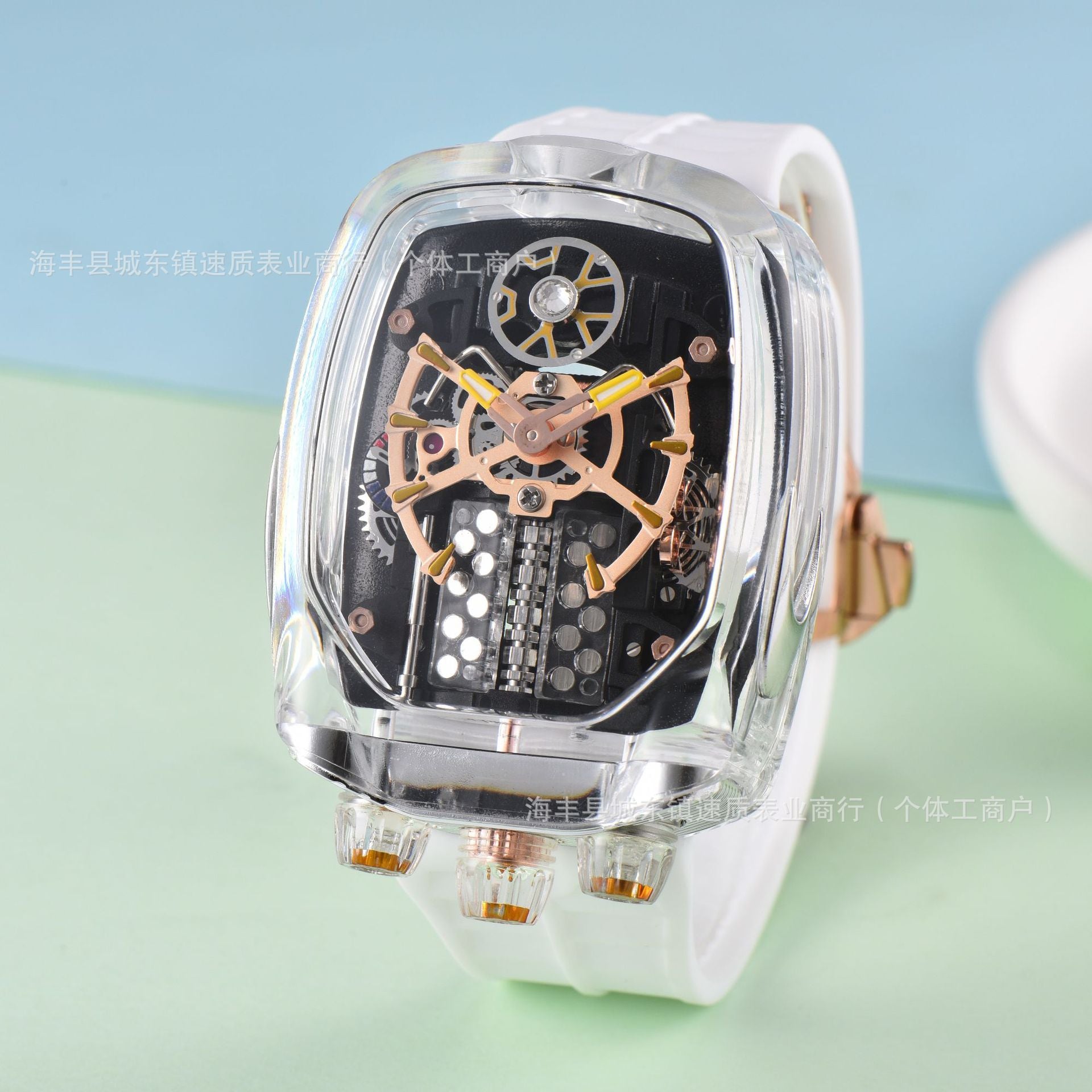 Transparent wristwatch with mechanical components on a light blue and green gradient background