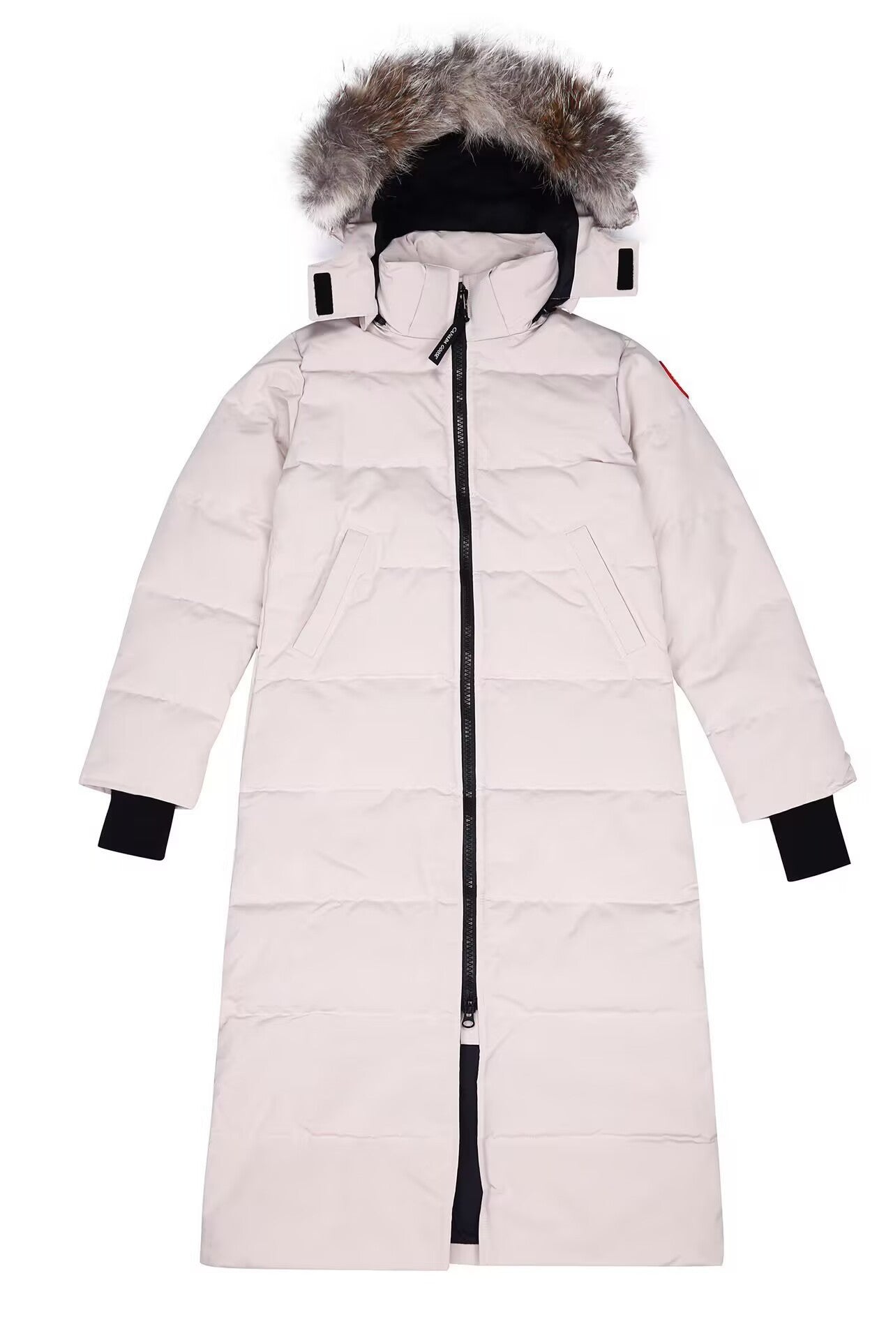 White winter coat with fur hood on a white background