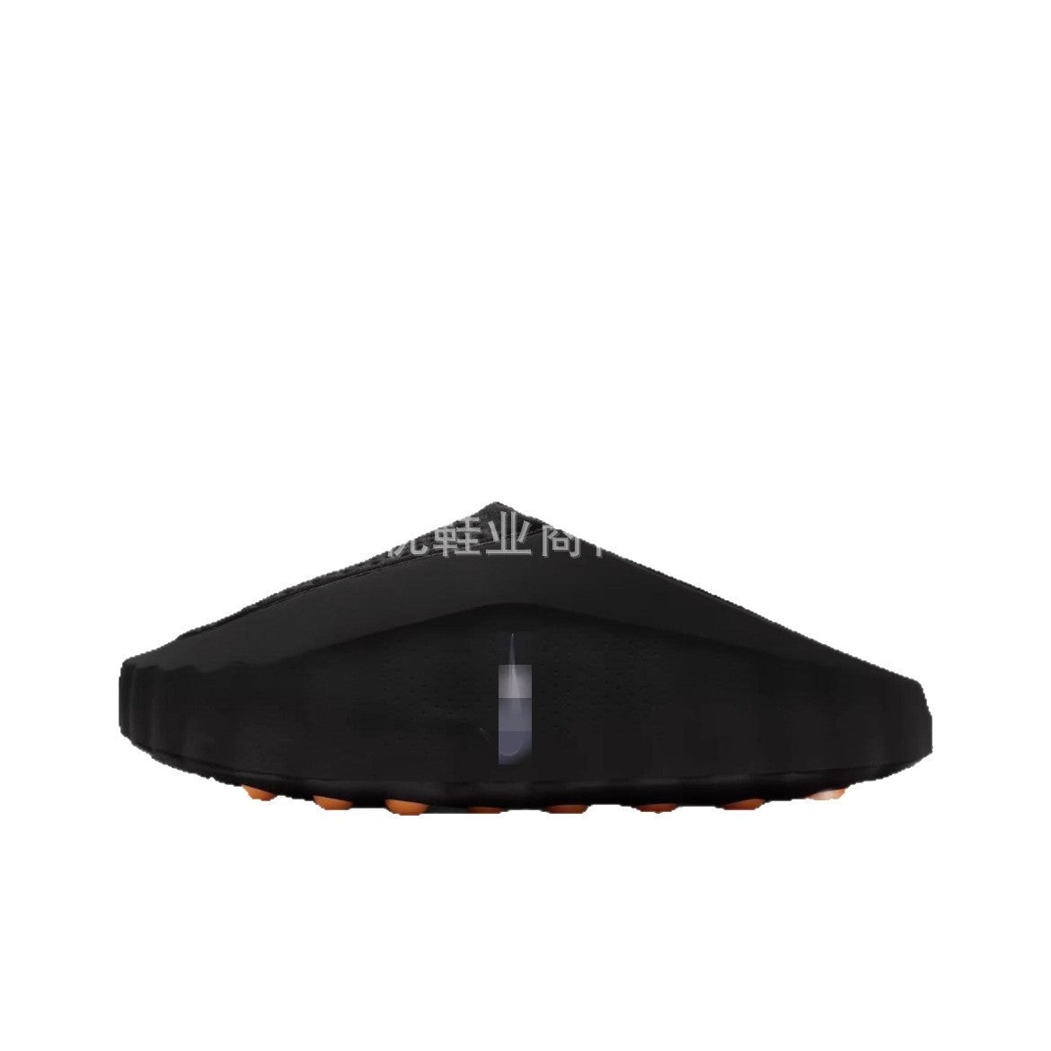 Black shoe sole with orange accents on a white background