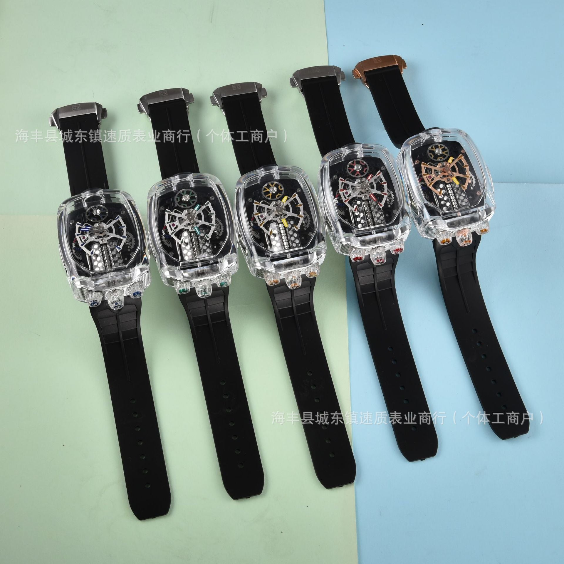 Five watches with transparent face and black straps on a light green and blue background