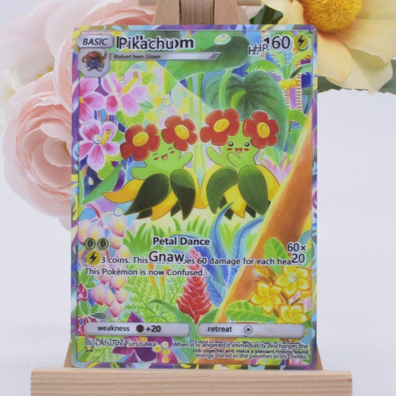 A Pokémon trading card featuring Pikachu with a colorful floral artwork design, displayed upright on a small wooden stand with soft pink and yellow flowers in the background.