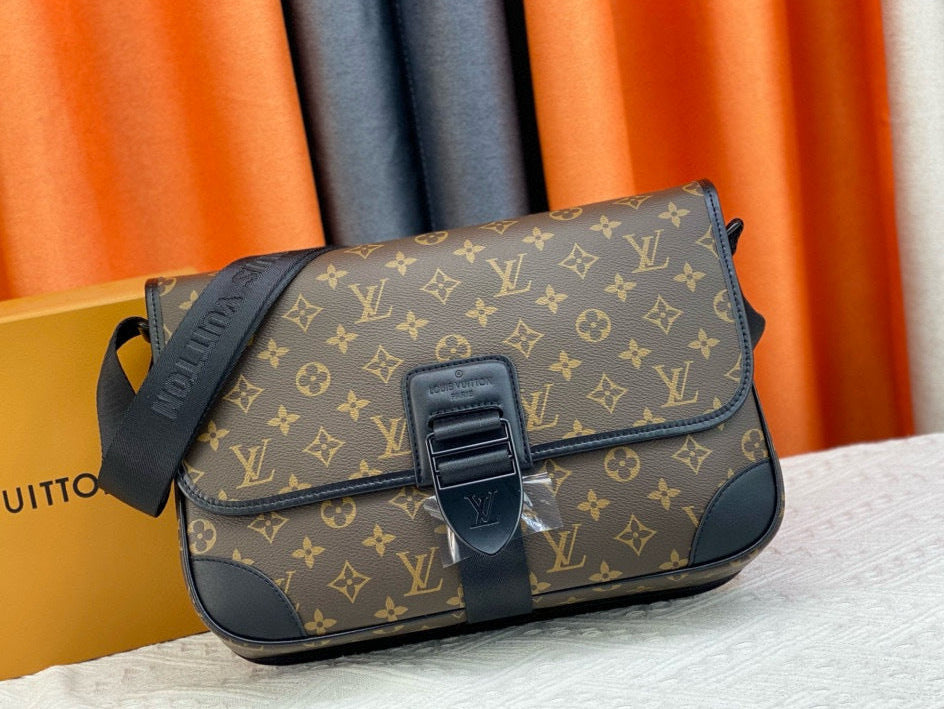 Louis Vuitton monogram handbag with a box in the background