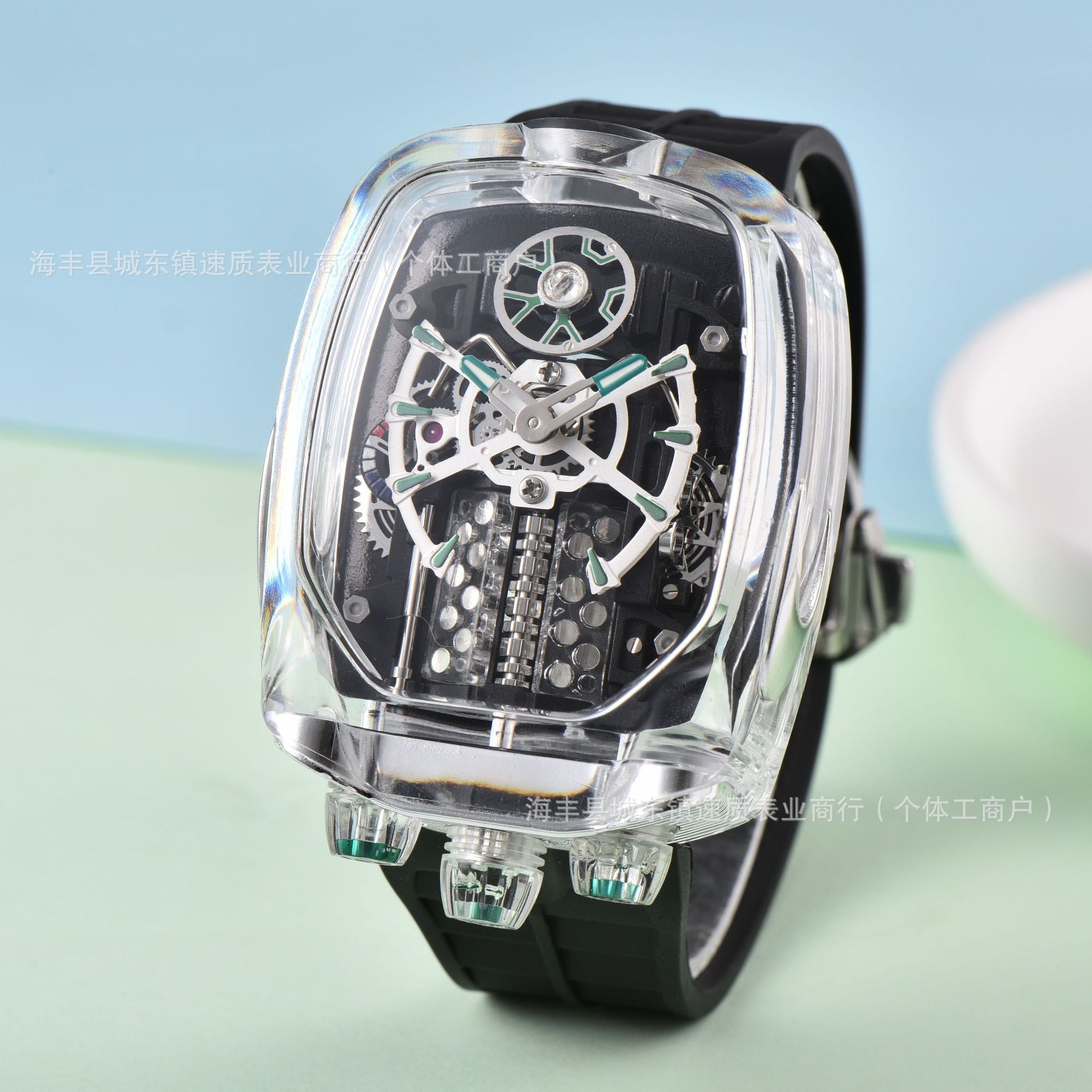 Transparent wristwatch with black strap on a light blue background