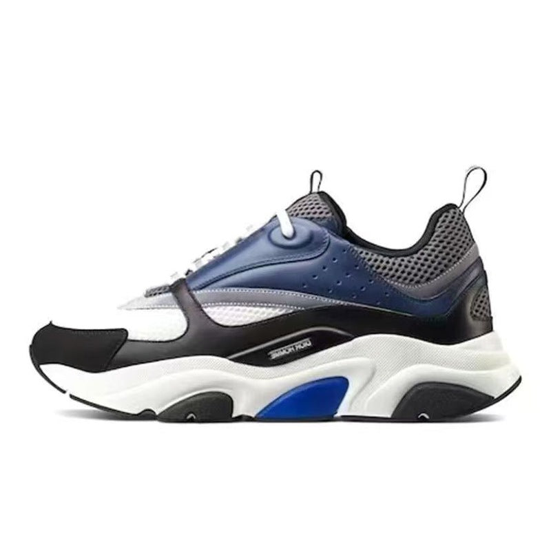Multicolor sneaker with black, white, and blue design on a white background