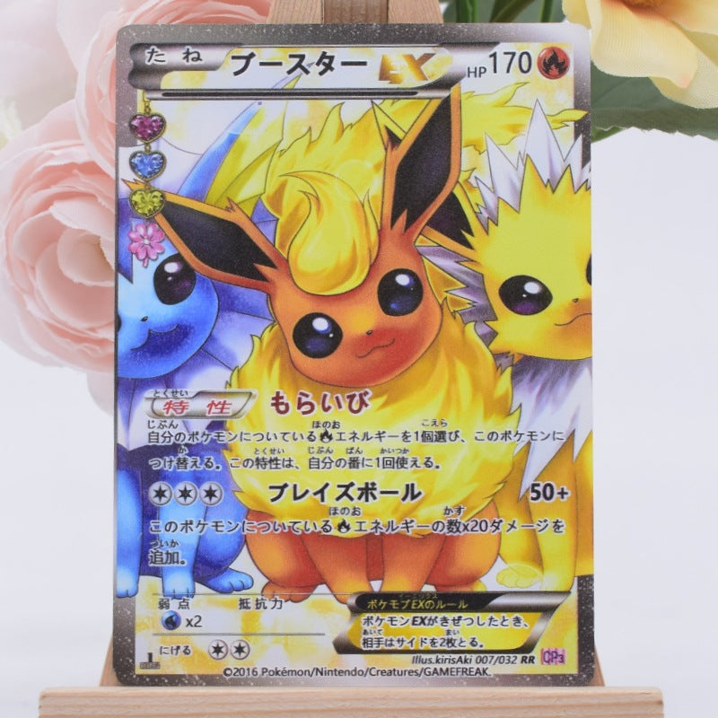 A Japanese Pokémon trading card featuring Flareon, displayed on a small wooden stand with pink flowers in the background.