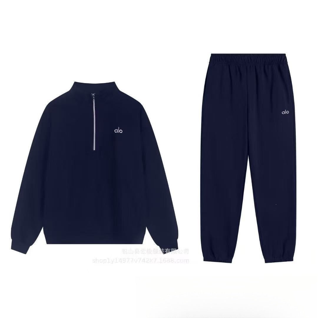 Gray hoodie and pants set on a white background