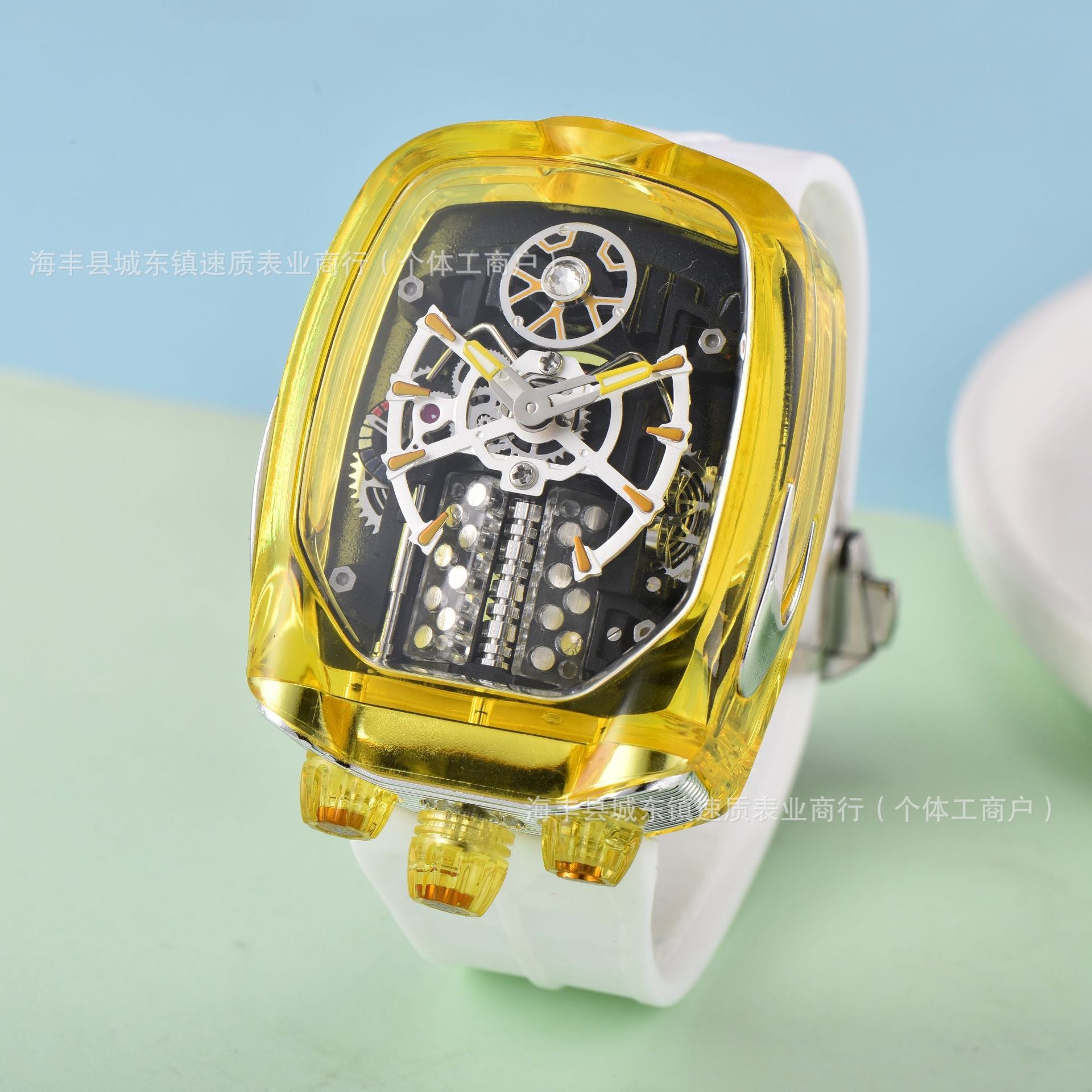 Watch with transparent yellow case and white strap on a light blue and green gradient background