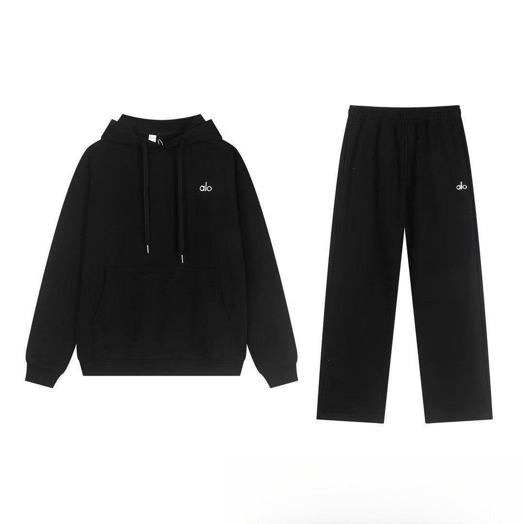 Black tracksuit with a brand logo on a white background