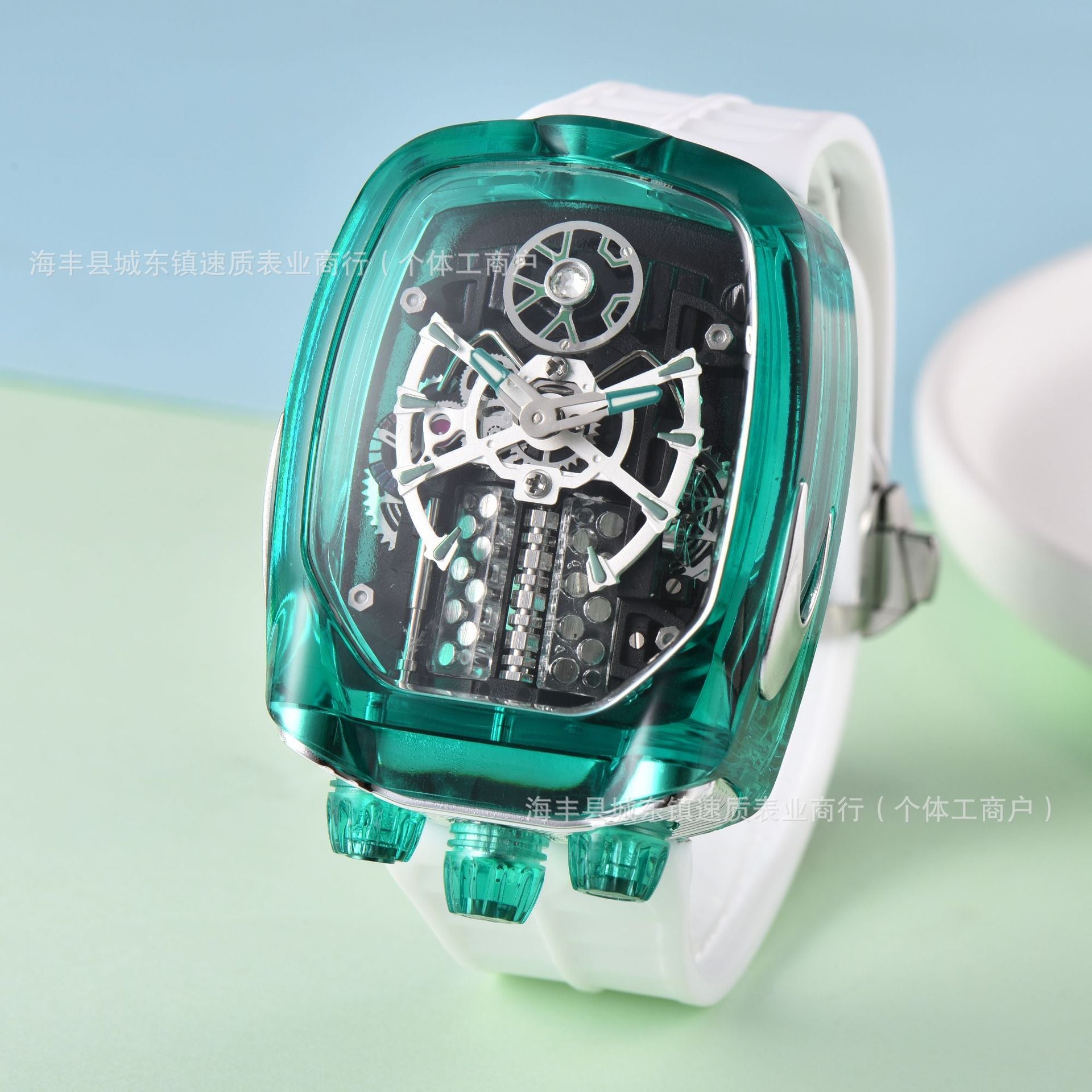 Watch with transparent green case and white strap on a light blue and green gradient background