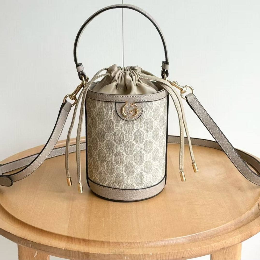 Bucket bag with a pattern on a wooden table against a white background