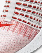 Close-up of a sneaker with red and white pattern