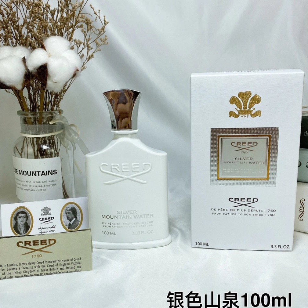 Creed mountain water bottle and packaging on a white background