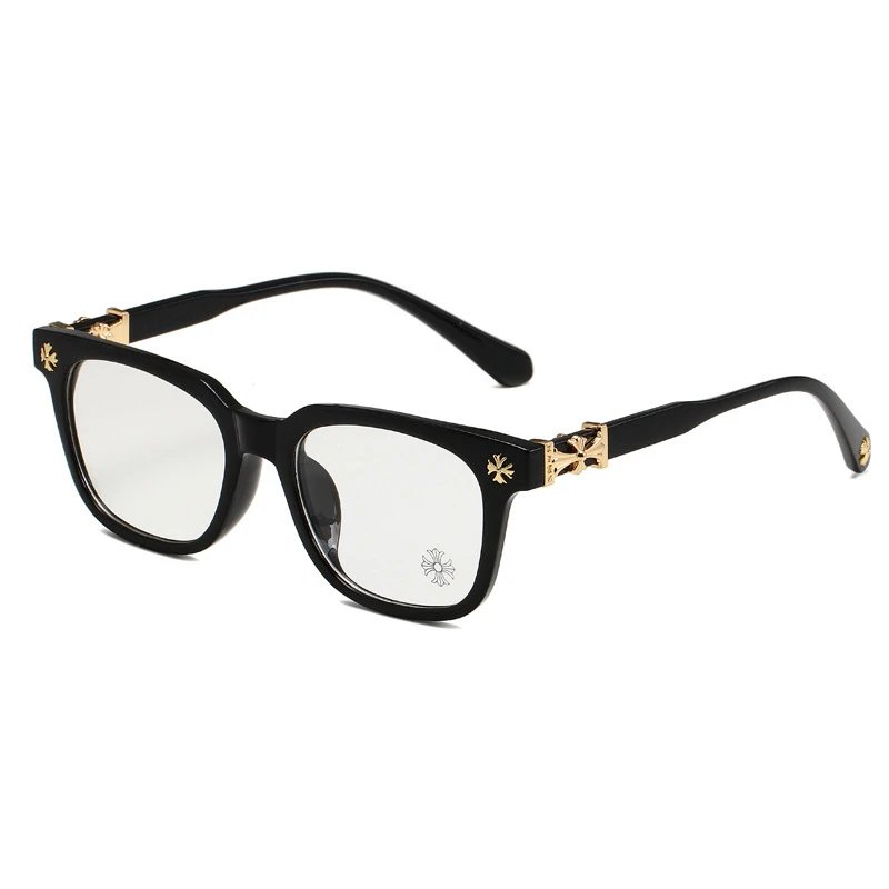 Black eyeglasses with gold accents on a white background