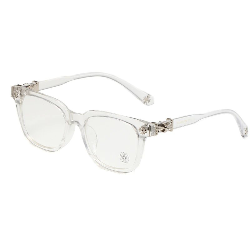 Clear eyeglasses with decorative metal accents on a white background