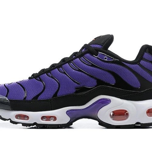 Purple and black sneaker with white sole on a white background