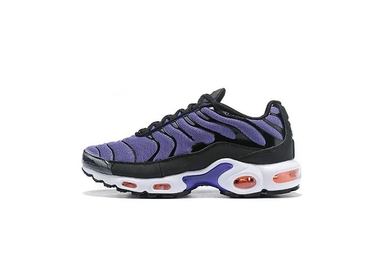 Purple and black sneaker with orange accents on a white background