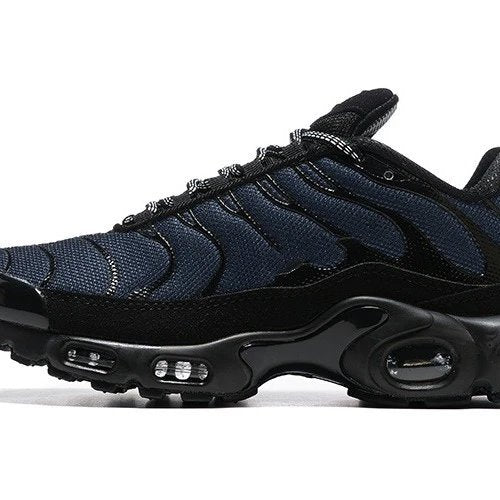Black and blue sneaker with visible air cushioning on a white background