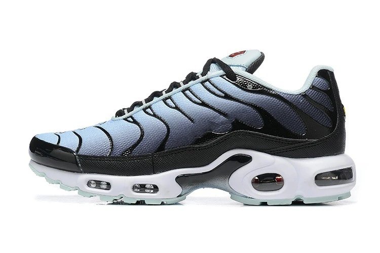 Black and gray sneaker with a white sole on a white background