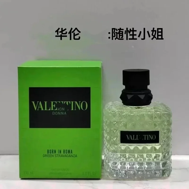 Valentino perfume bottle and packaging on a gray background