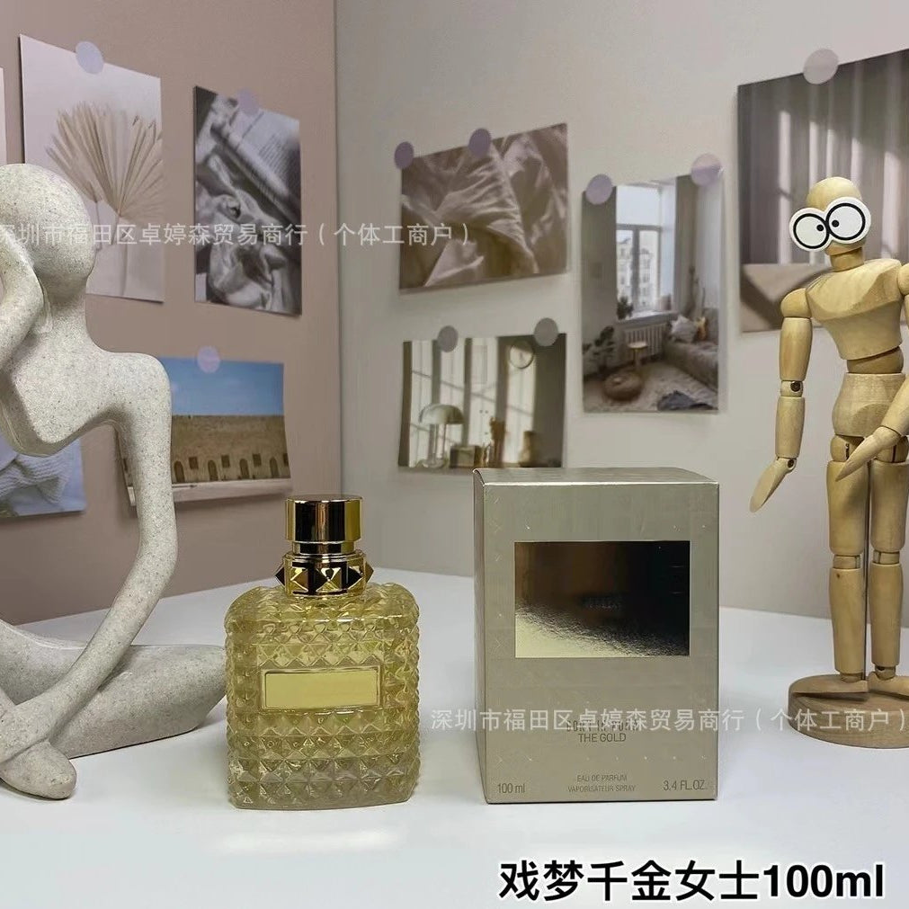 Perfume bottle and packaging with decorative elements on a table