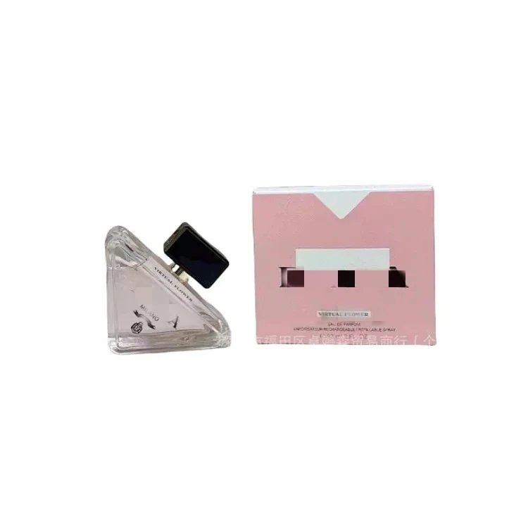 Triangle-shaped perfume bottle with pink packaging on a white background