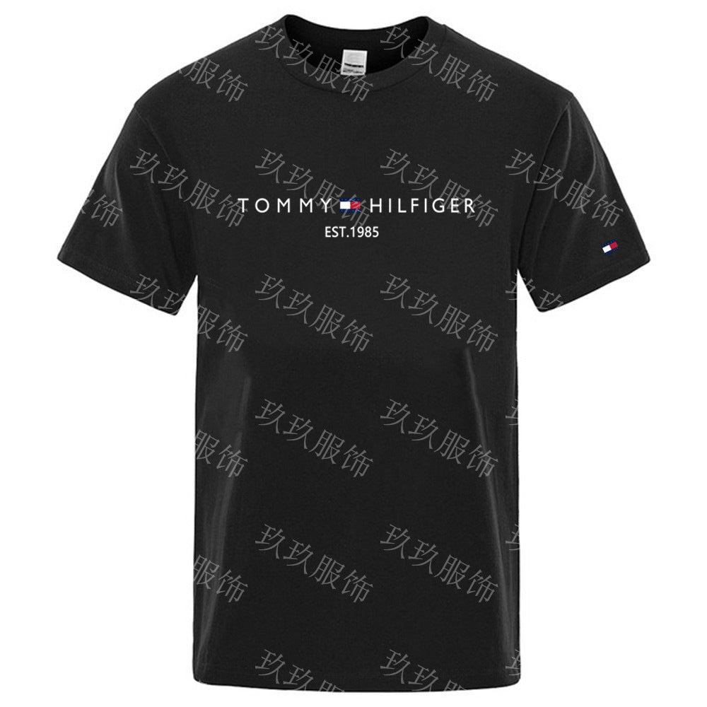 Black Tommy Hilfiger t-shirt with logo on a white background
