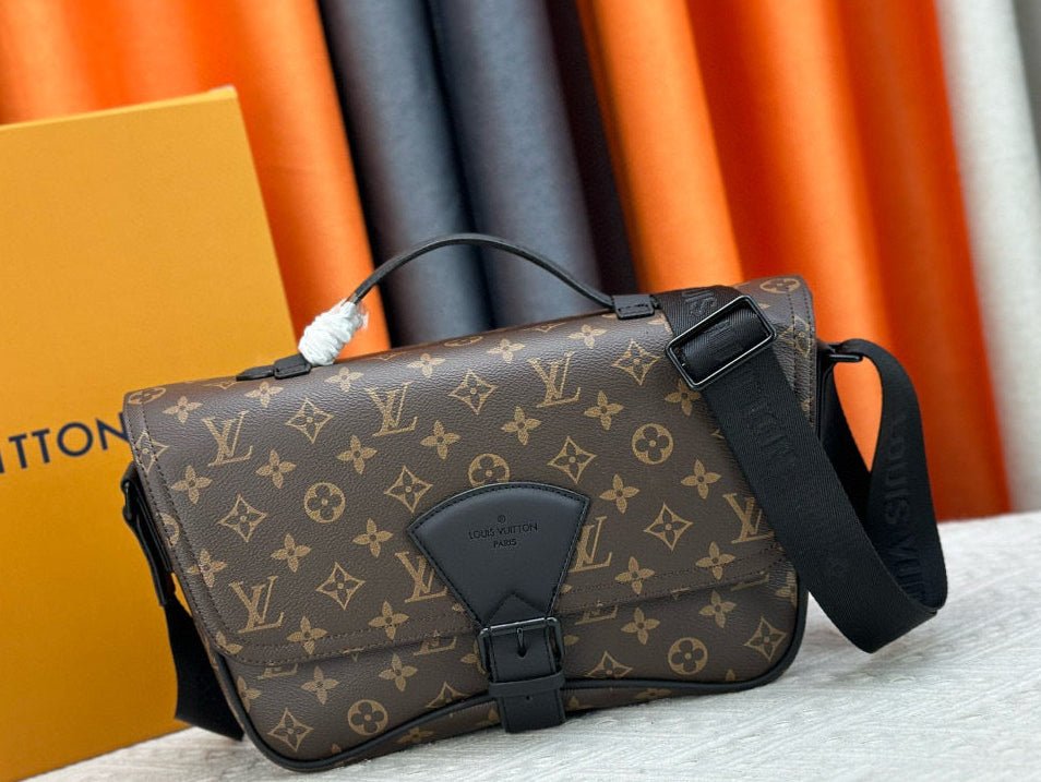 Designer handbag with monogram pattern on a textured surface with colorful background