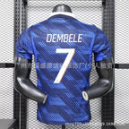 Blue sports jersey with 'DEMBELE' and number '7' on a mannequin against a grid background.